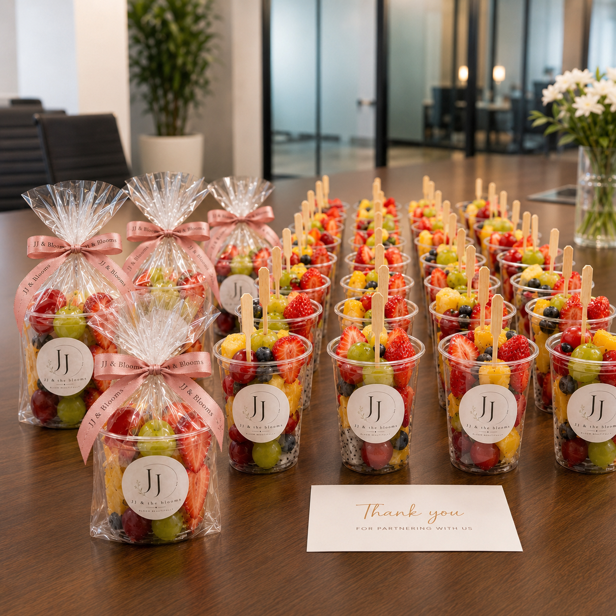 Corporate fruit cups prepared with JJ & The Blooms packaging